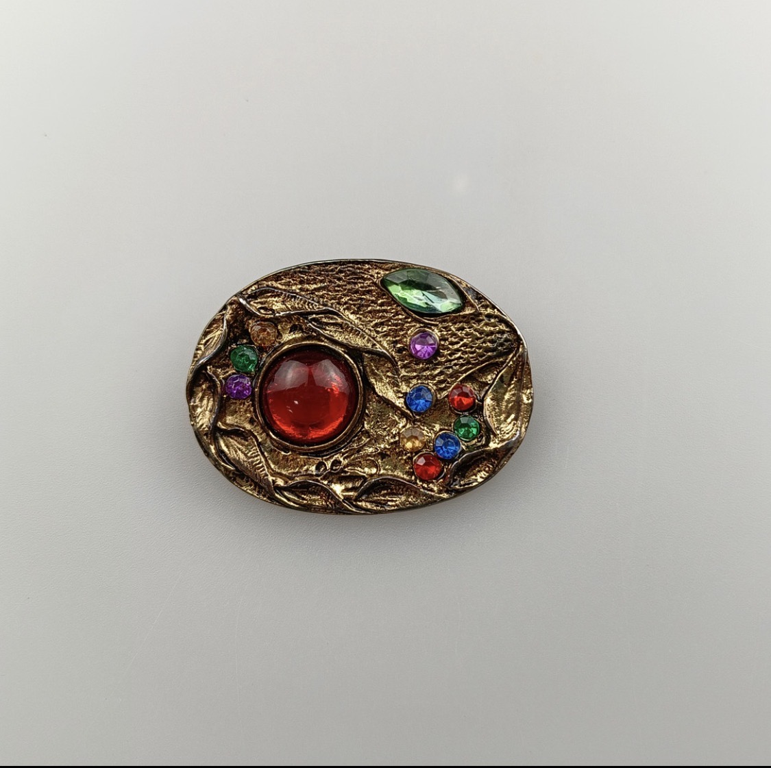 Vintage Renaissance Style Brooch With A Red Cabochon Centre