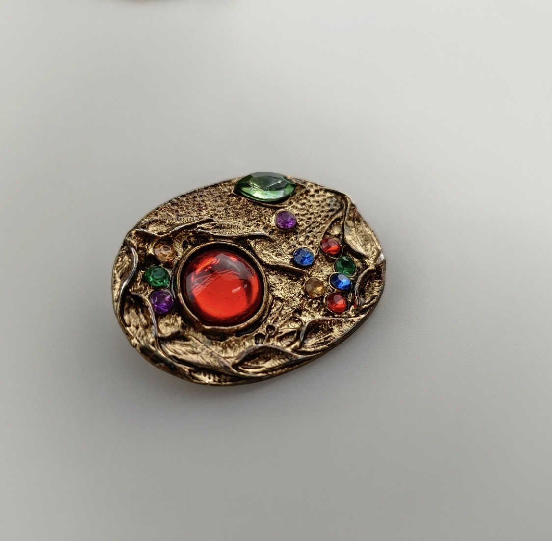 Vintage Renaissance Style Brooch With A Red Cabochon Centre