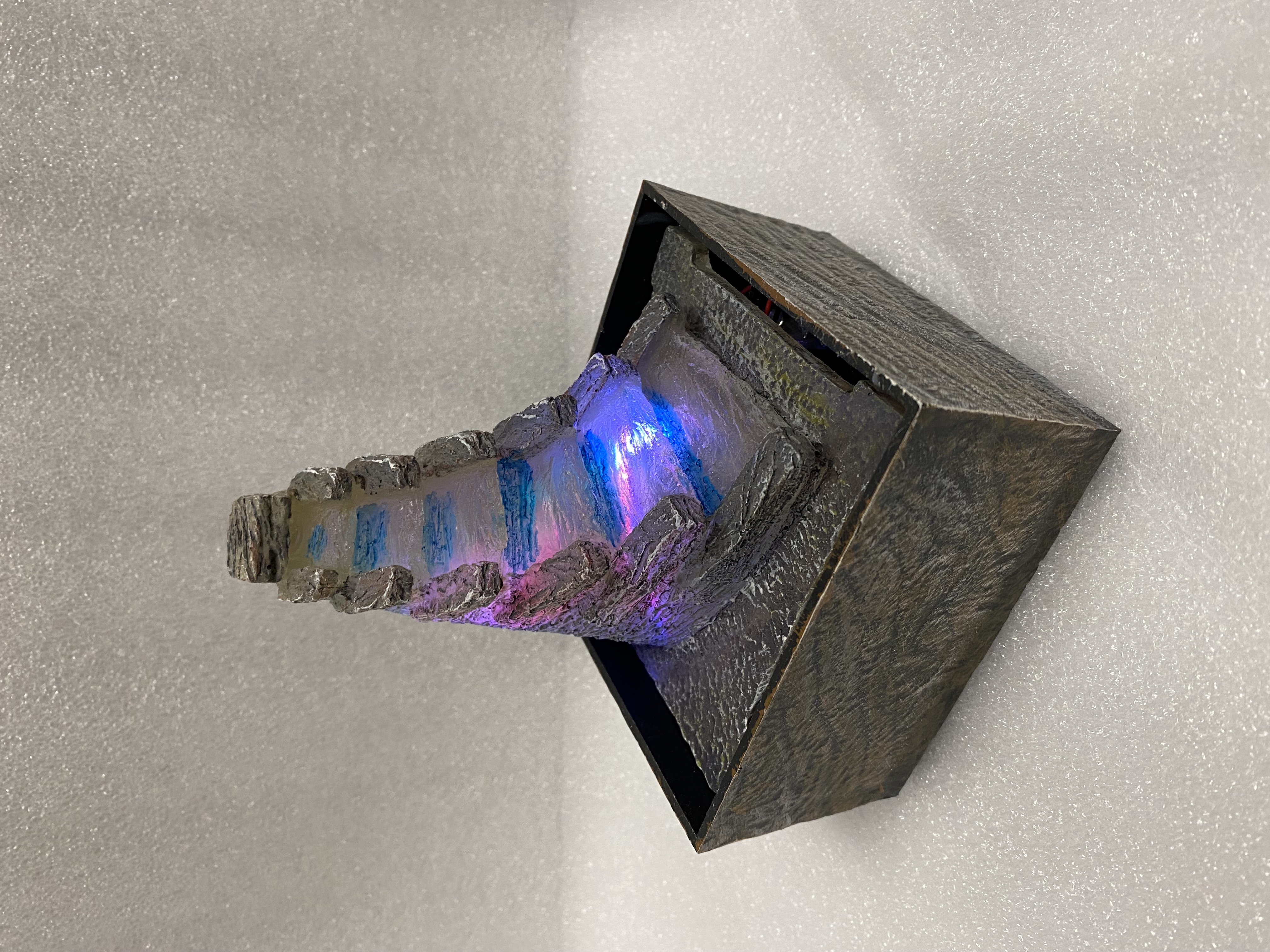 Water fountain with colour changing LED