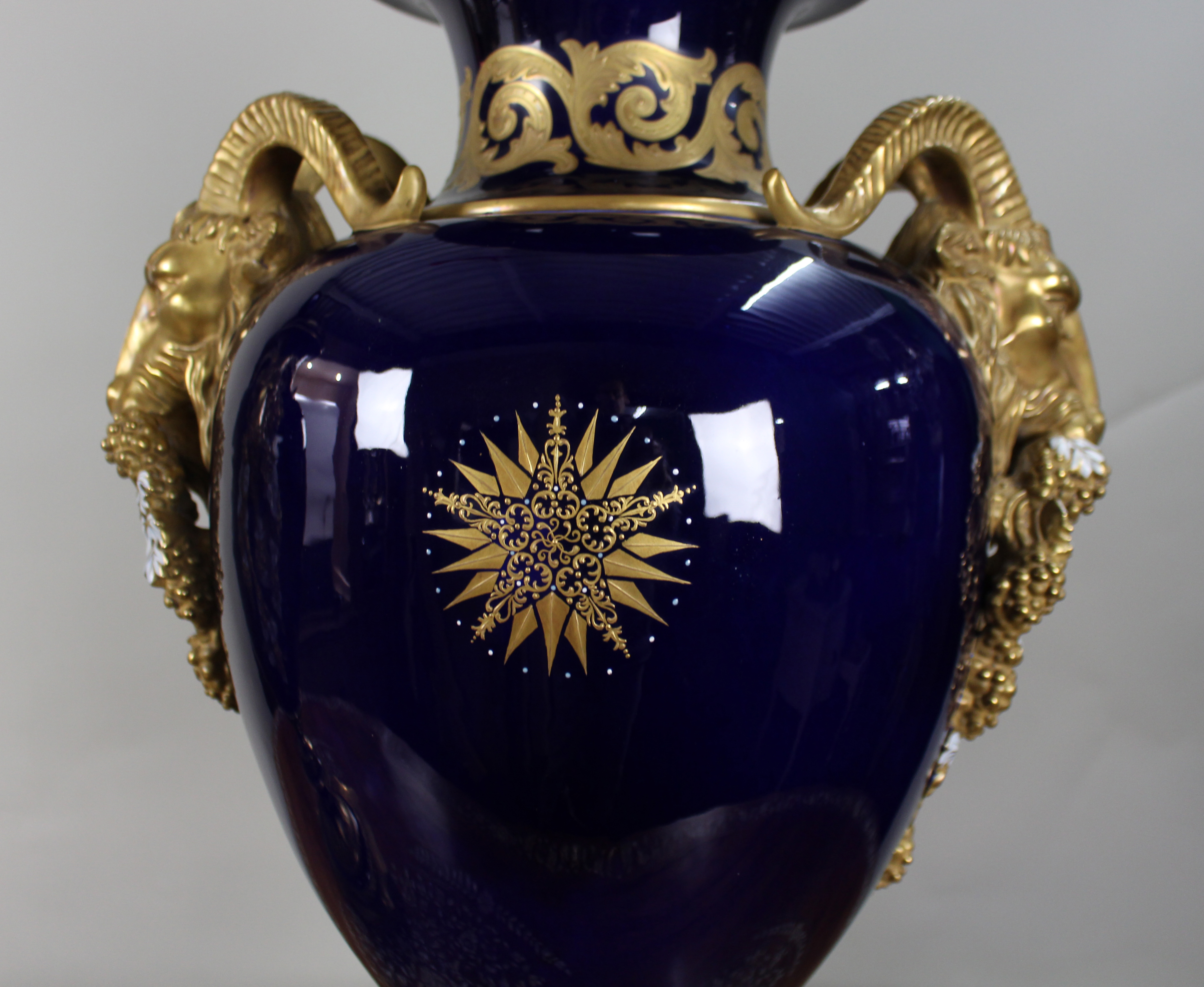 Pair of Fine Sevres Style Cobalt Blue Rams Head Lidded Urns
