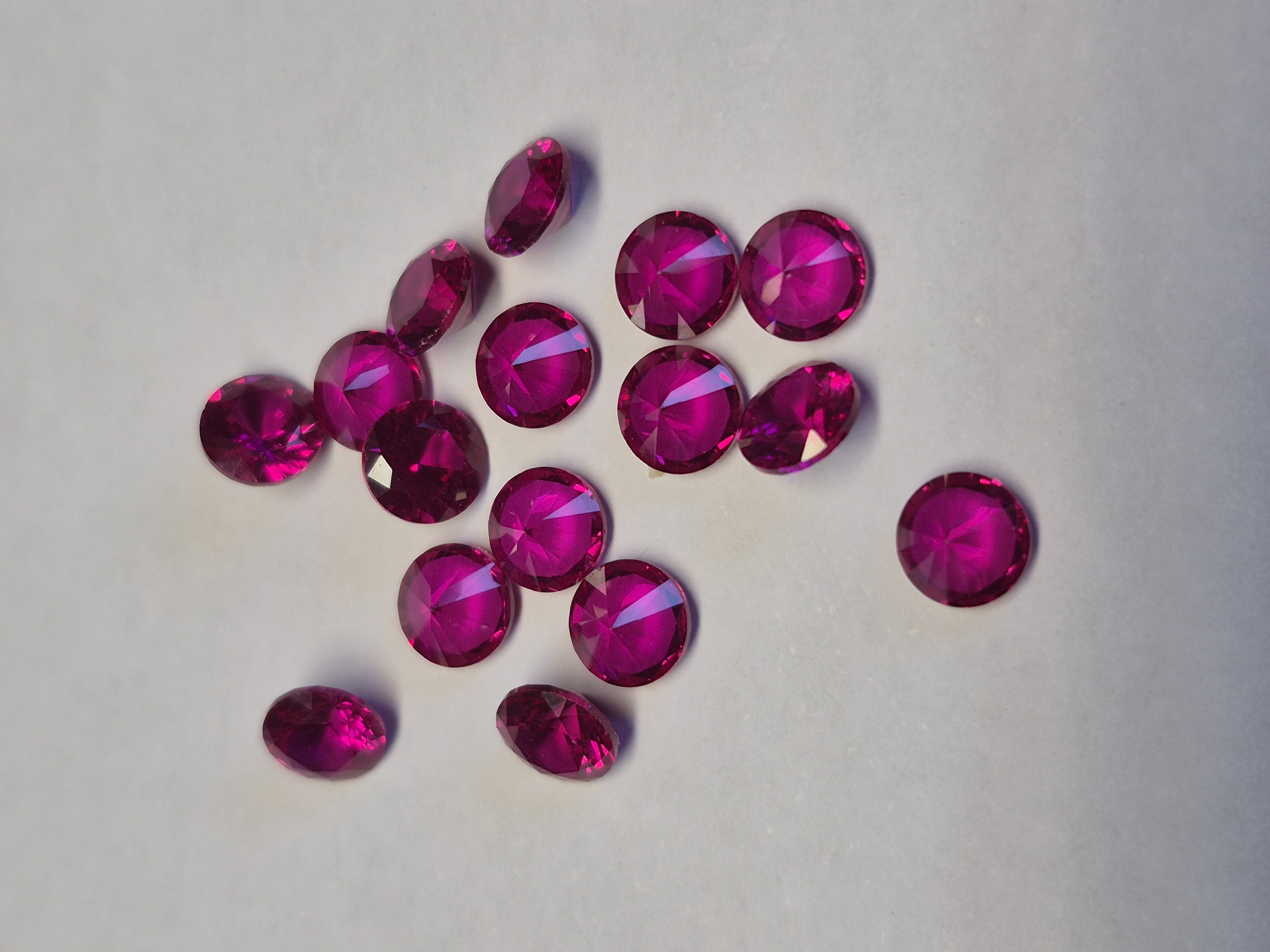 Lot of 13 Ruby Red Corundum Gemstones – Total 9.36 Carats – Round Cut 5 mm