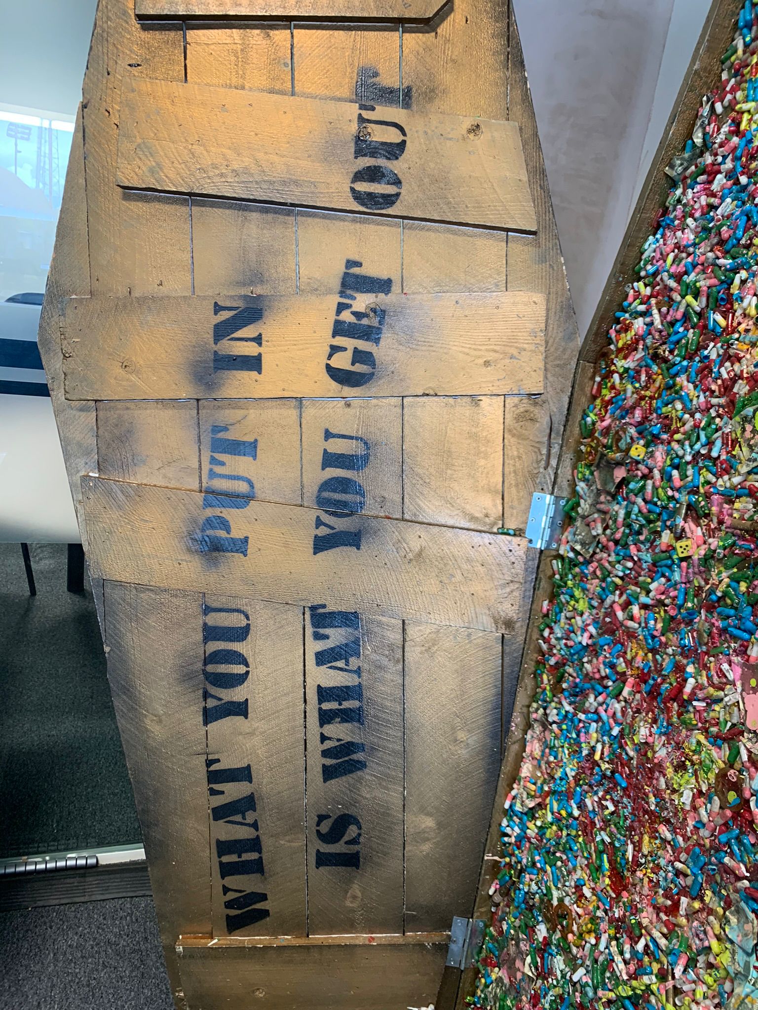Maximilian Wiedemann "You get out what you put in, full-size Coffin Sculpture