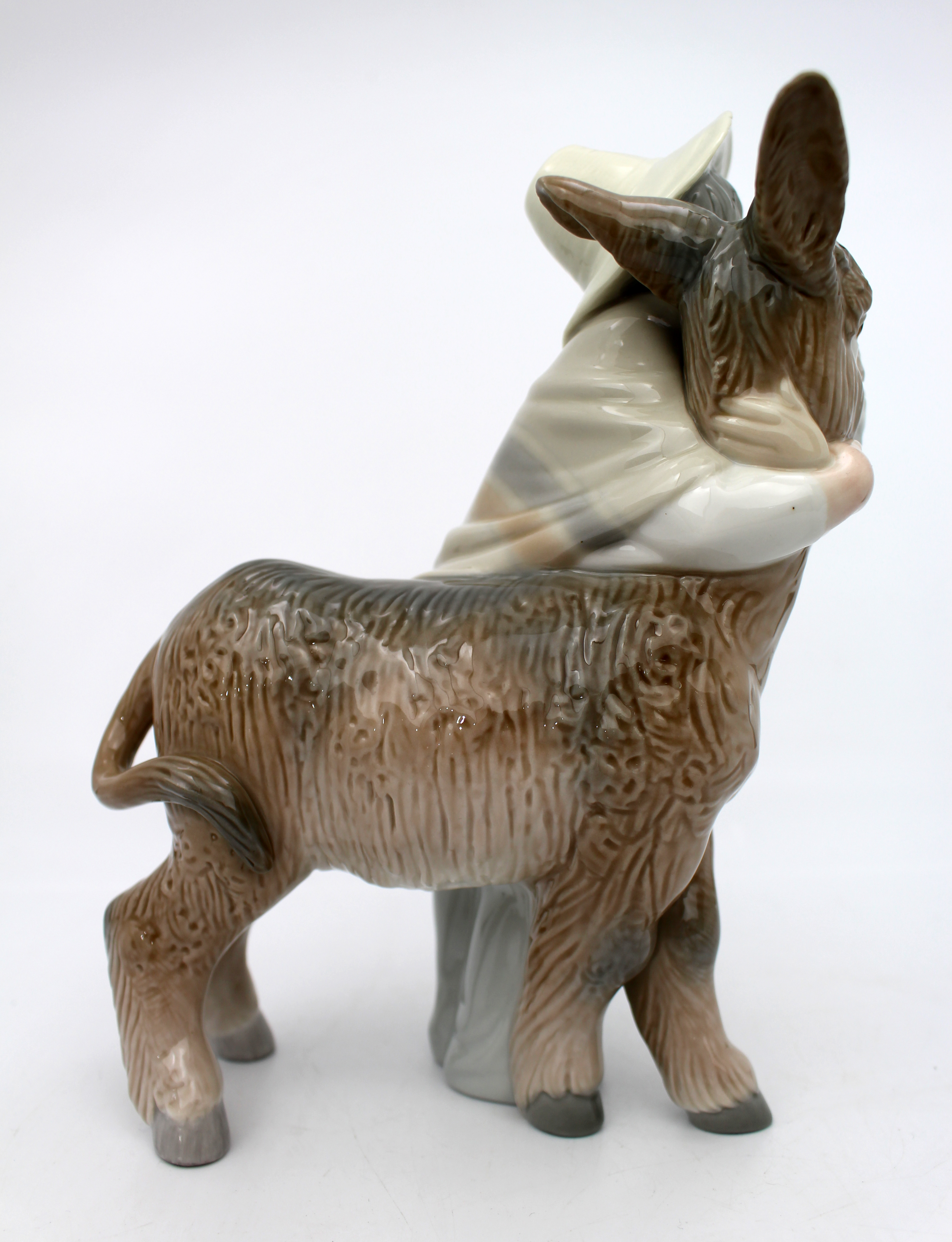 Lladro Boy Hugging Donkey