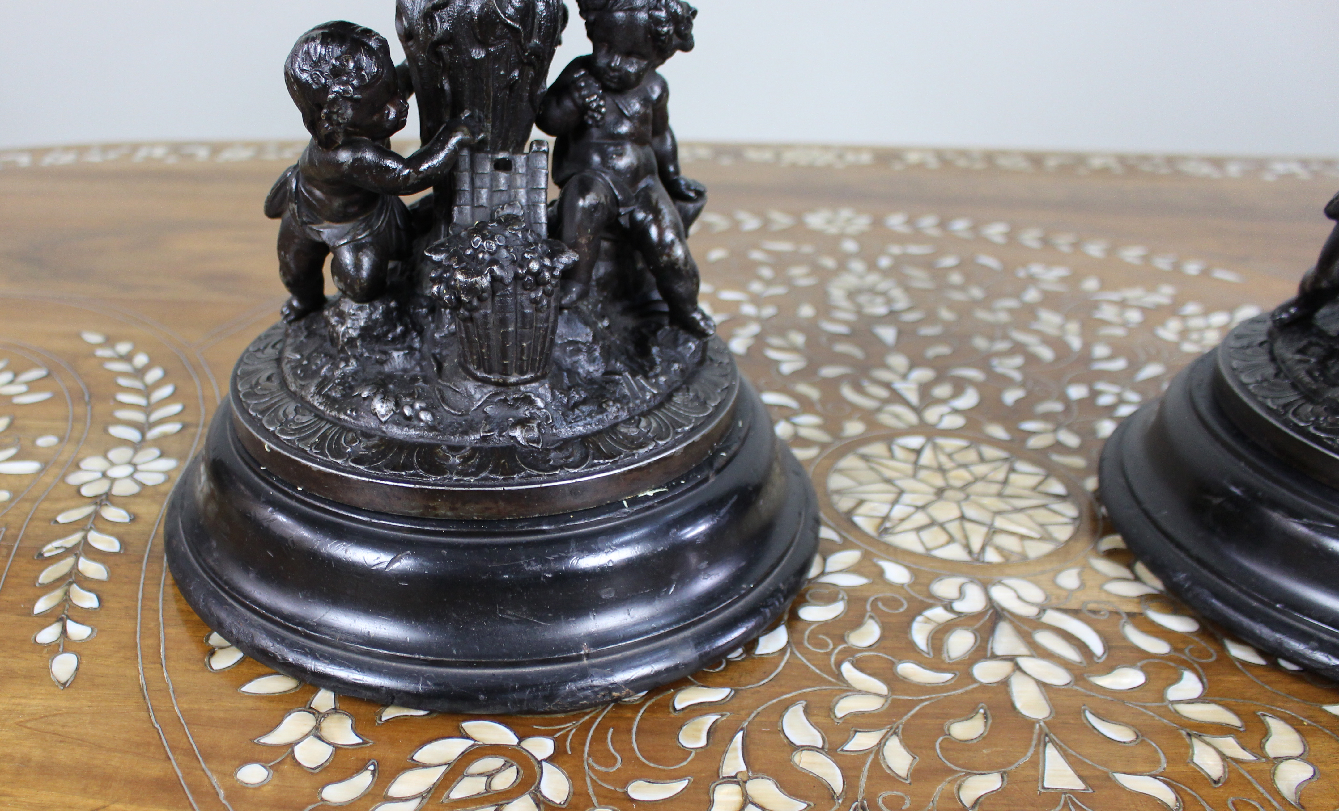 Pair of French Bronzed Spelter Urns with Bacchic Masks and Putti, Circa 1880