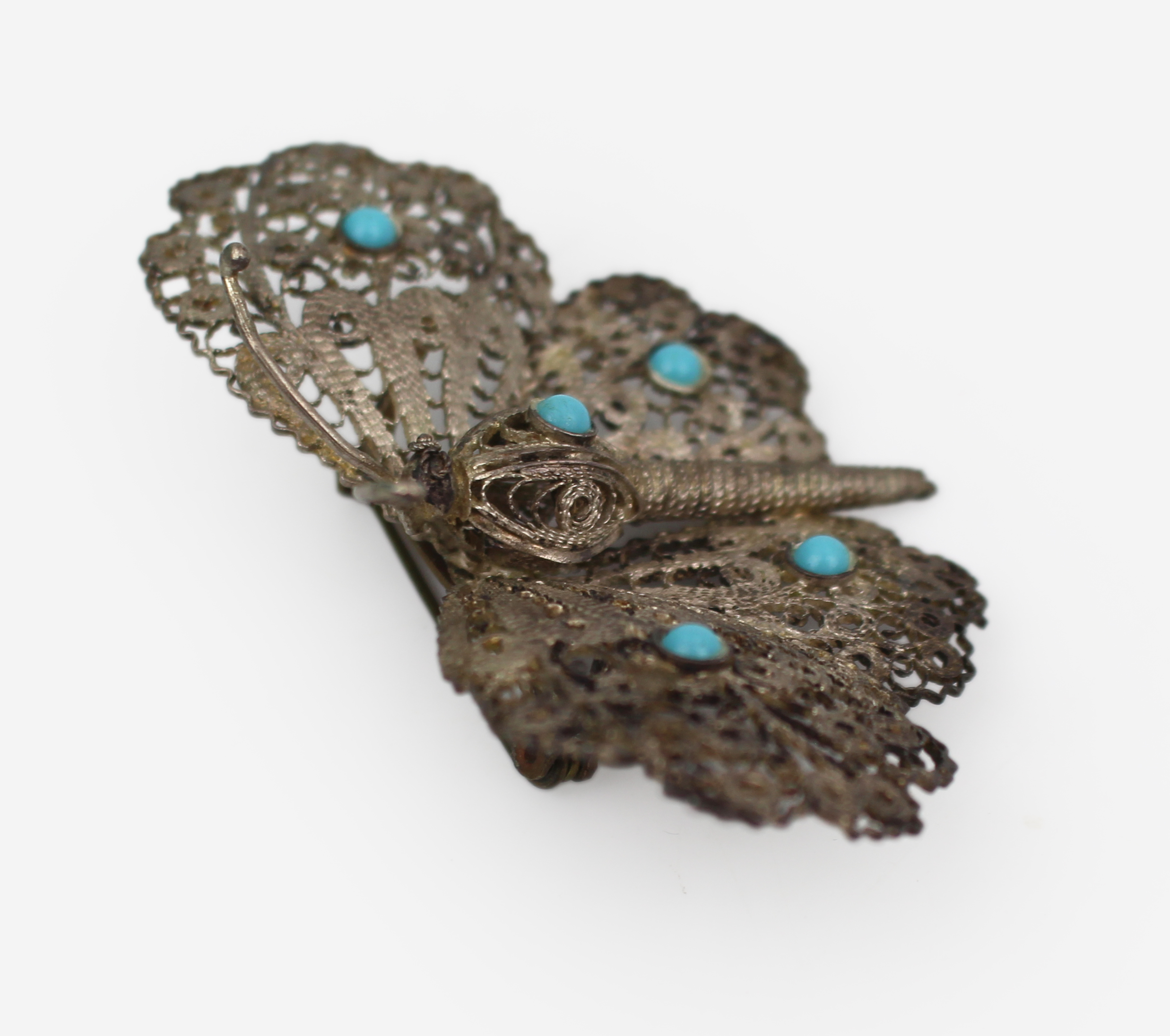 Early 20th Century Silver Filigree Butterfly Brooch with Turquoise Cabochons