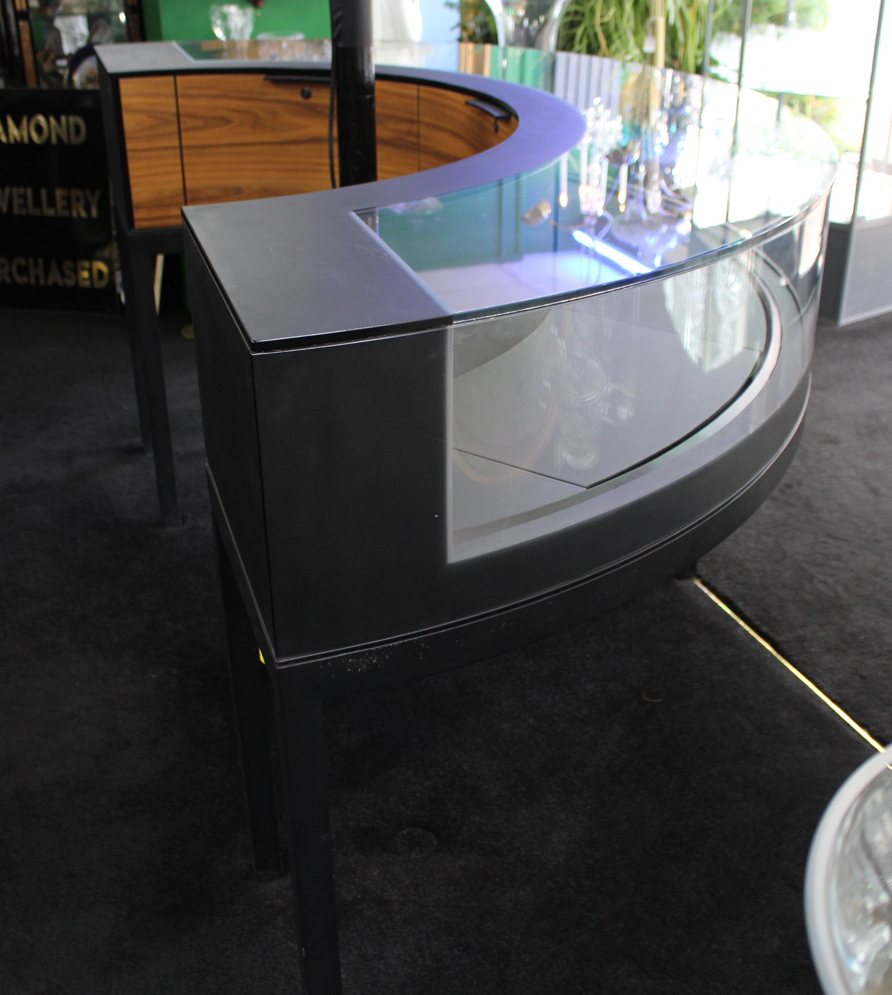 Georg Jensen Showroom Cabinet in Curved Glass and Ebonised Steel